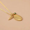 Gold fingerprint pendant necklace.