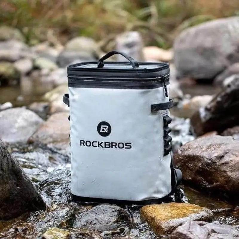 White waterproof bag with black trim.