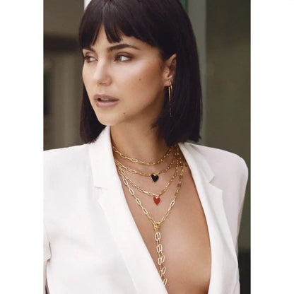 Woman rocking a stunning Jamie Enamel Heart Gold Plated Link Necklace with layered hearts