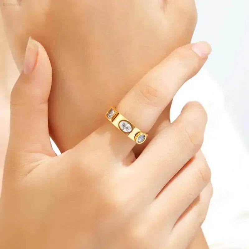 Gold ring with embedded gems.