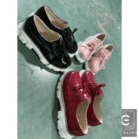 Strut in Style: Burgundy & Black Patent Leather Platforms for Comfort - Estalios