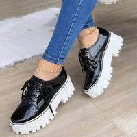 Strut in Style: Burgundy & Black Patent Leather Platforms for Comfort - Estalios
