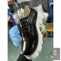 Strut in Style: Burgundy & Black Patent Leather Platforms for Comfort - Estalios