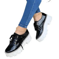 Strut in Style: Burgundy & Black Patent Leather Platforms for Comfort - Estalios