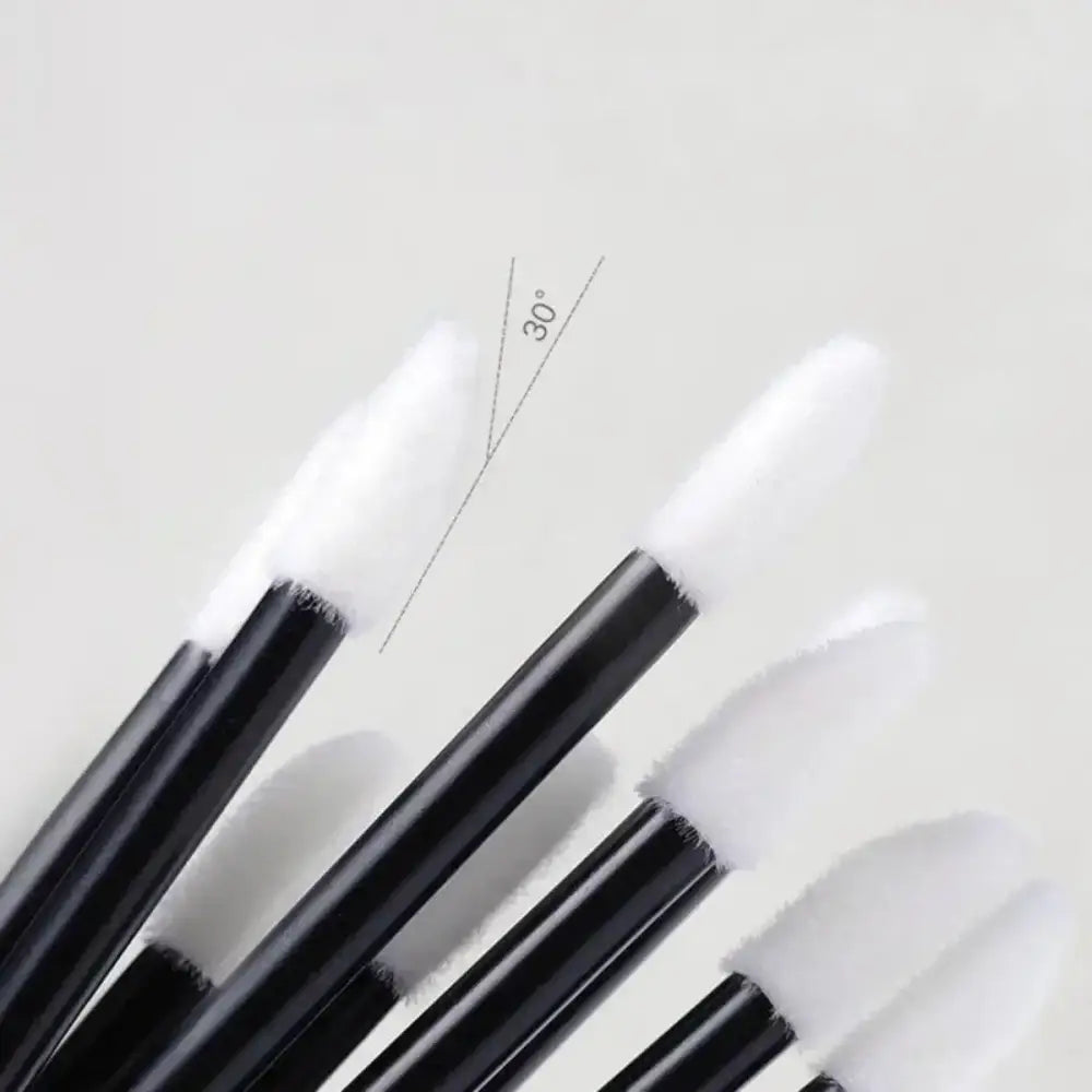 Black-handled disposable lip brush from Lanjinglin 50pcs set for women’s makeup