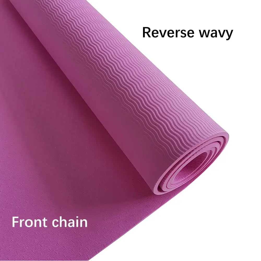 Partially rolled Large Size Slip Yoga Mat in purple, perfect for fitness enthusiasts