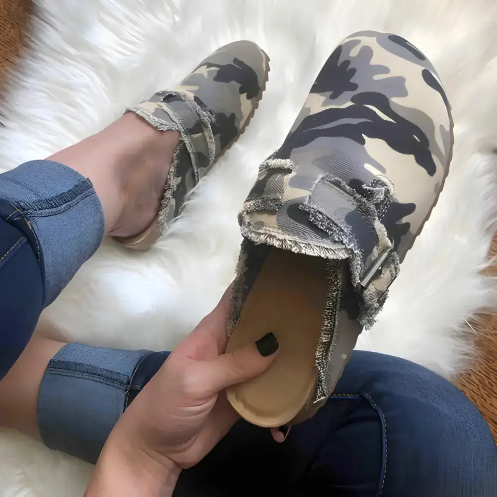 Camo print clog shoe with flat heel round toe style, perfect for casual wear