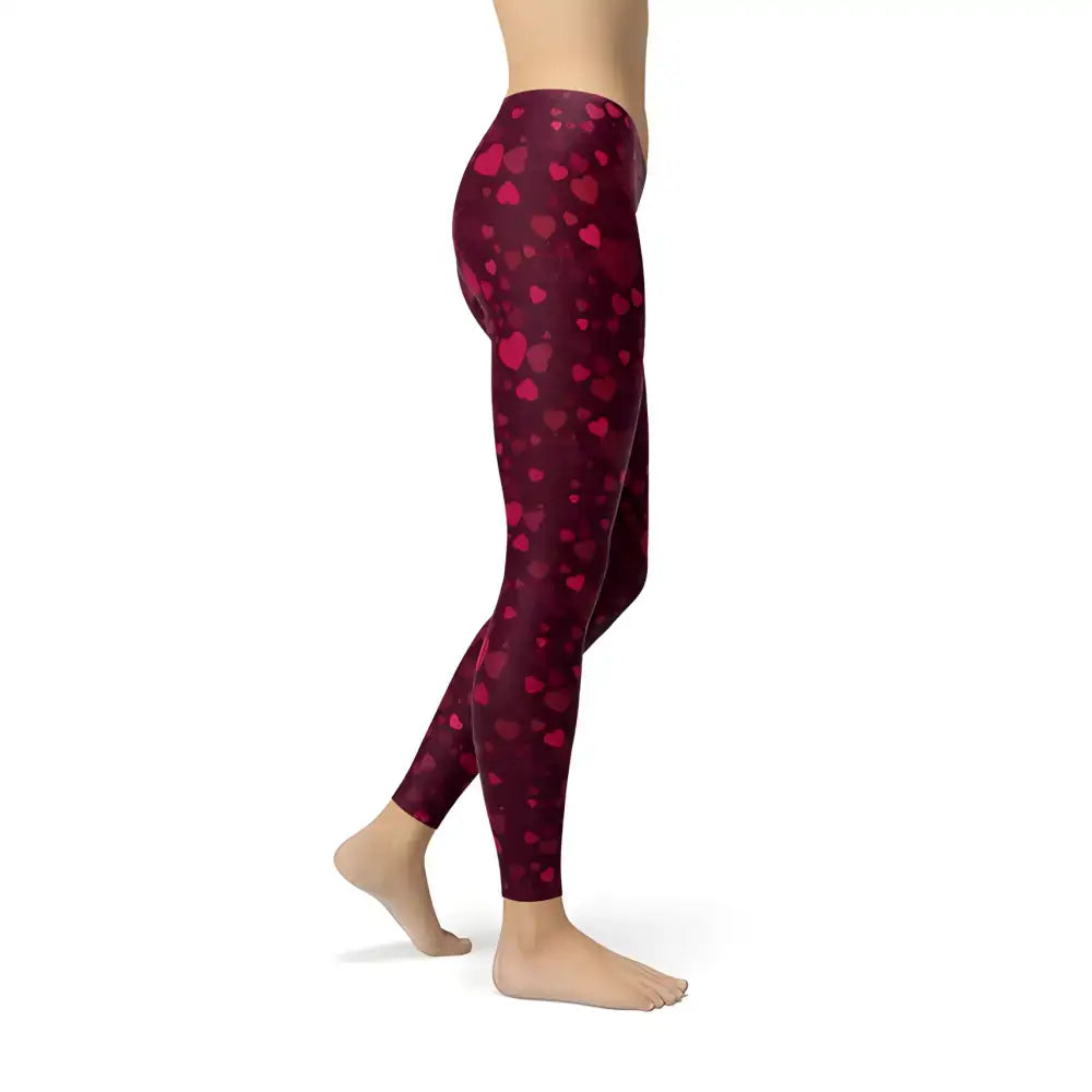 Burgundy leggings with a cute heart pattern, perfect for cozy outfits and easy style