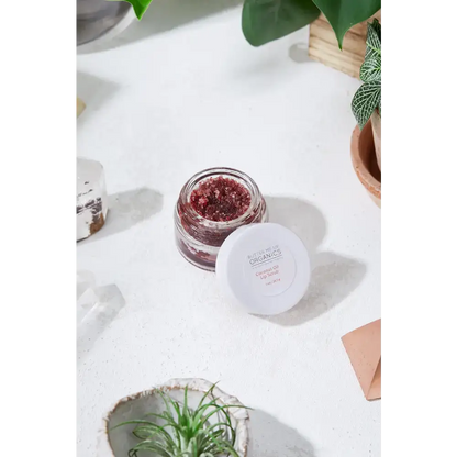 Open jar of Luscious Organic Coconut Lip Scrub, a completely edible red scrub