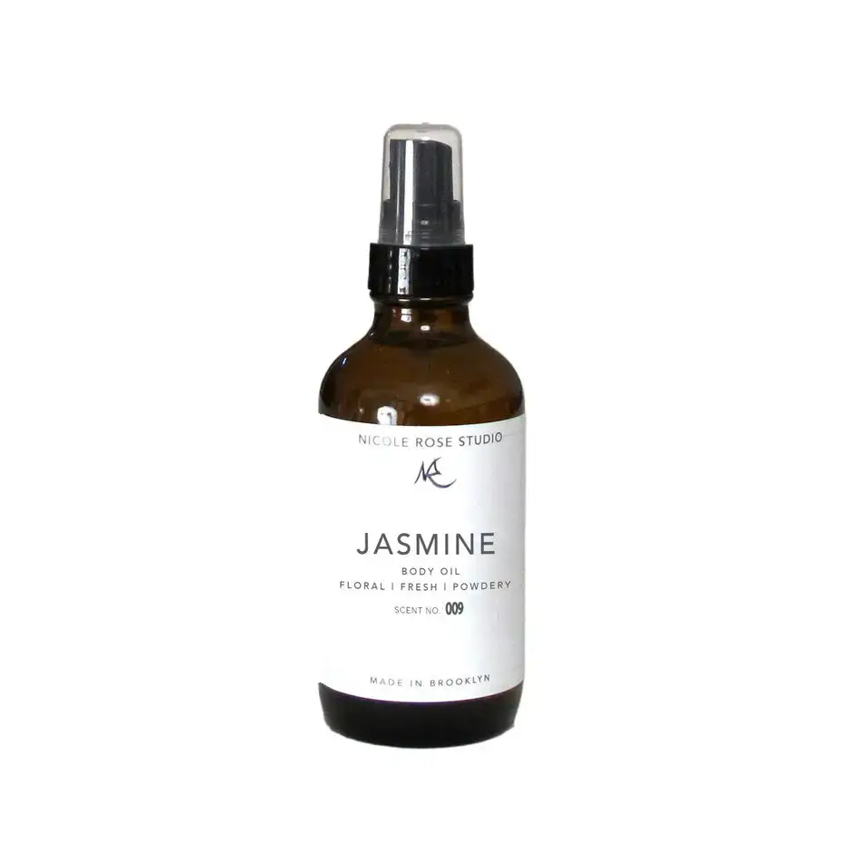 Jasmine Essential Body Oil Mist in a brown glass bottle with spray nozzle