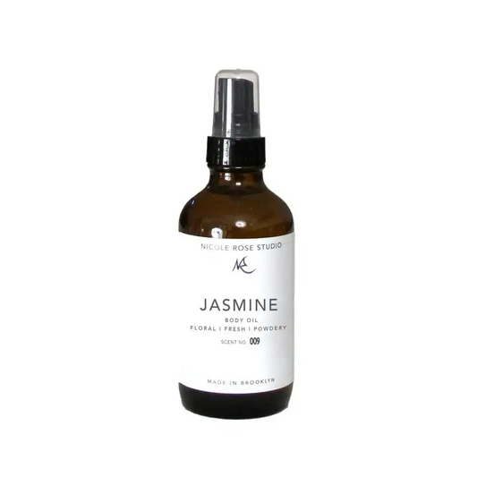 Jasmine Essential Body Oil Mist in a brown glass bottle with spray nozzle