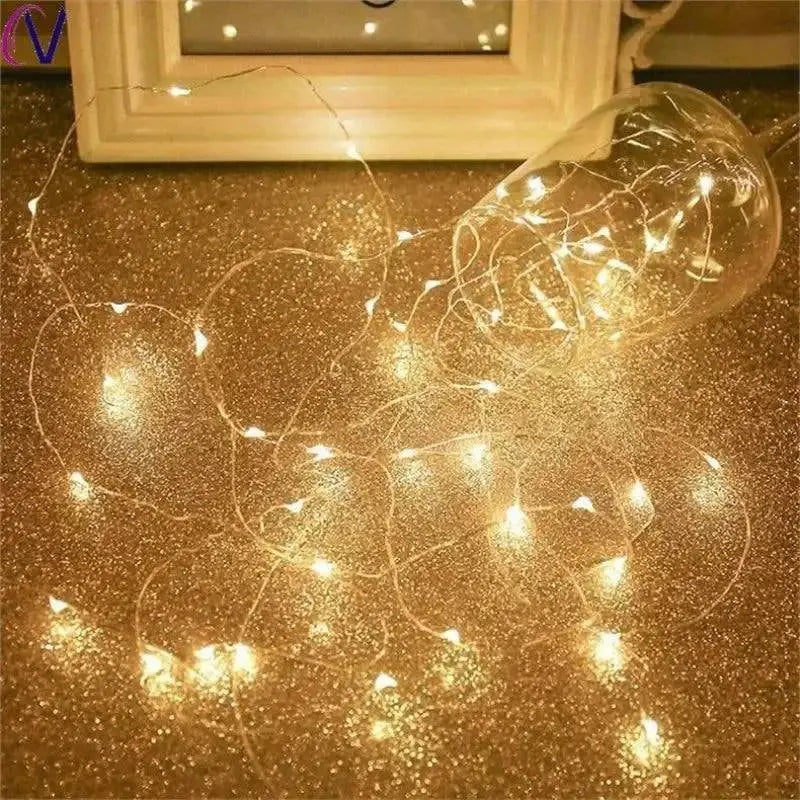 Magical USB LED Fairy Light Cloches featuring silver wire garland in a glass bulb