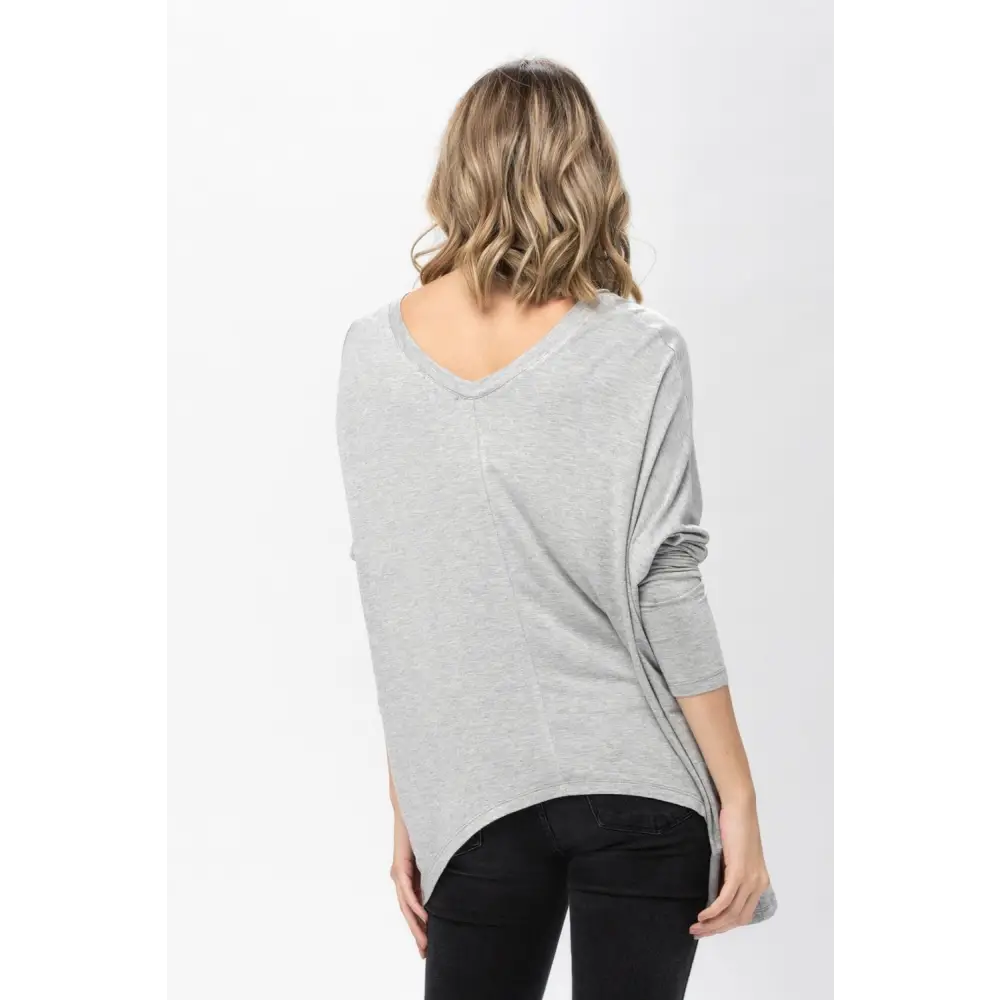 Gray long-sleeved knit tunic blouse with dolman sleeves for a stylish oversized look