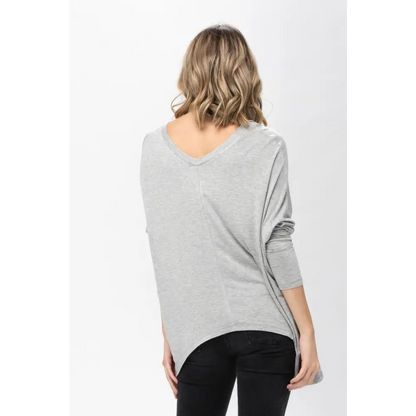 Gray long-sleeved knit tunic blouse with dolman sleeves for a stylish oversized look