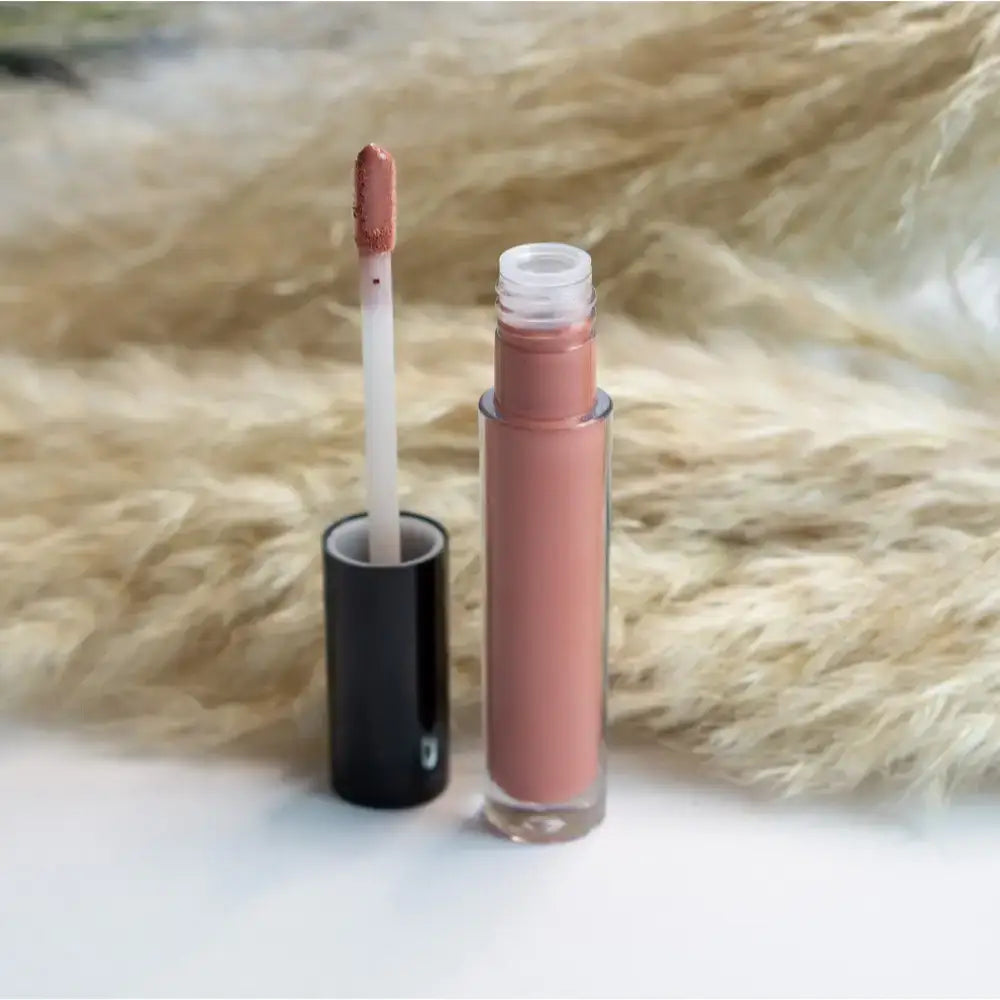 Open tube of Mauve Rouge Liquid Lip Gloss showing natural finish options for a chic look