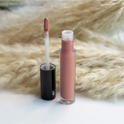 Open tube of Mauve Rouge Liquid Lip Gloss showing natural finish options for a chic look