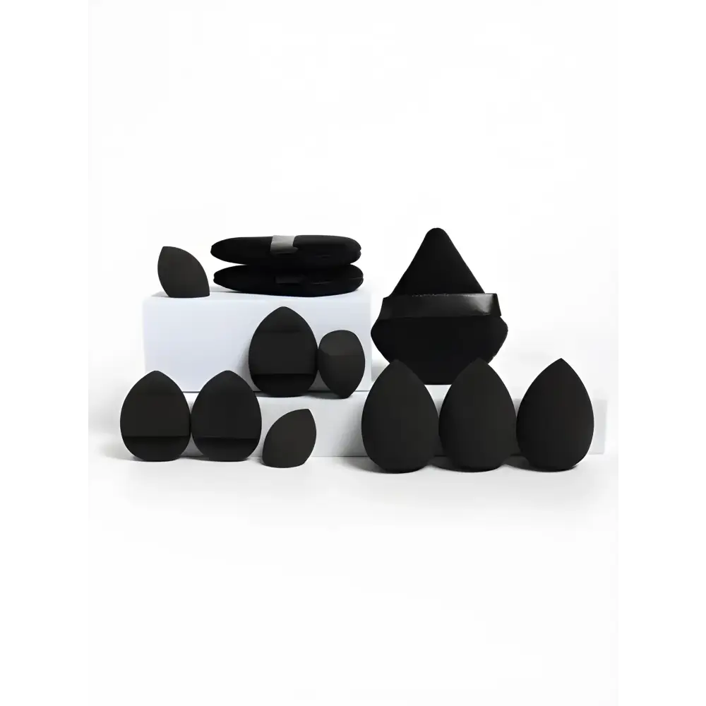 Black makeup sponges and powder puffs from the Mega Makeup Sponge Set for a flawless look