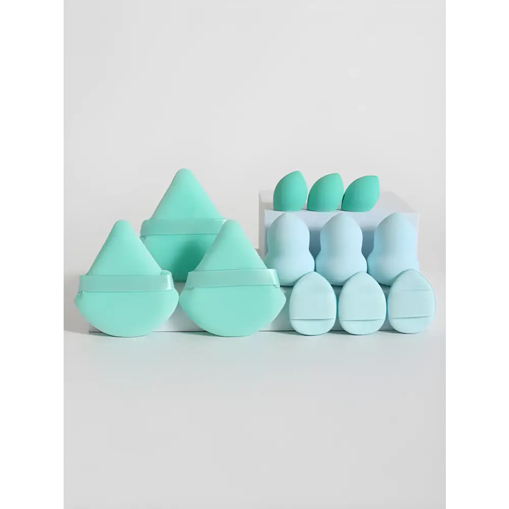 Assorted mint-colored sponges from the Mega Makeup Sponge Set & Loose Powder Puffs