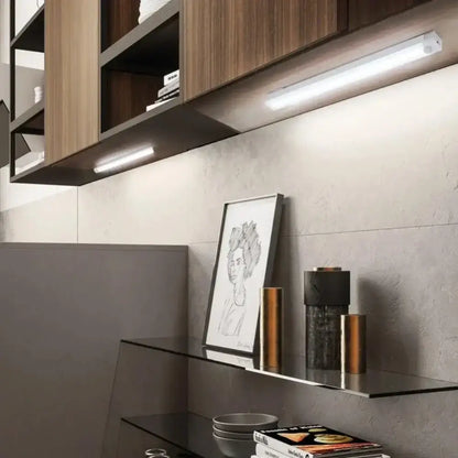 Motion sensor LED light bar for under-cabinet lighting in low-light areas