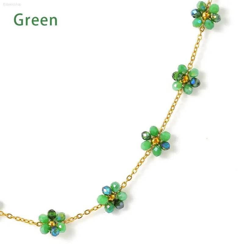 Green beaded flower chain.