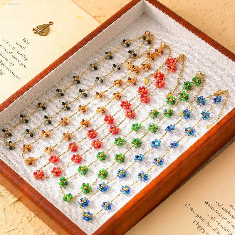 Colorful beaded flower necklaces.