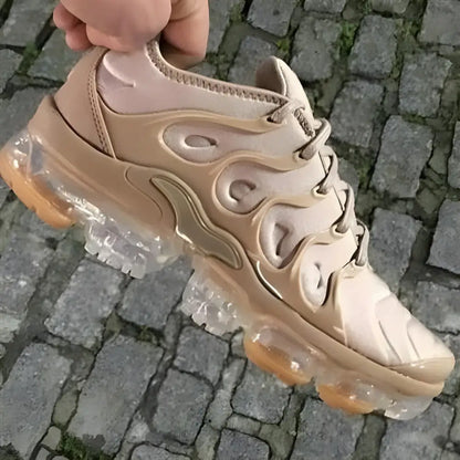 Tan Nike Air VaporMax sneaker featuring a clear bubble sole for summer style