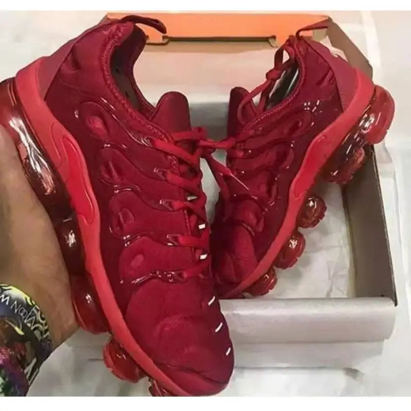 Red Nike Air VaporMax sneakers perfect for summer athletic vibes and casual outings