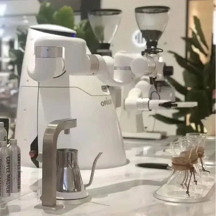 Orionstar Dual-Arm Robot serving coffee with a cool robotic brewing system