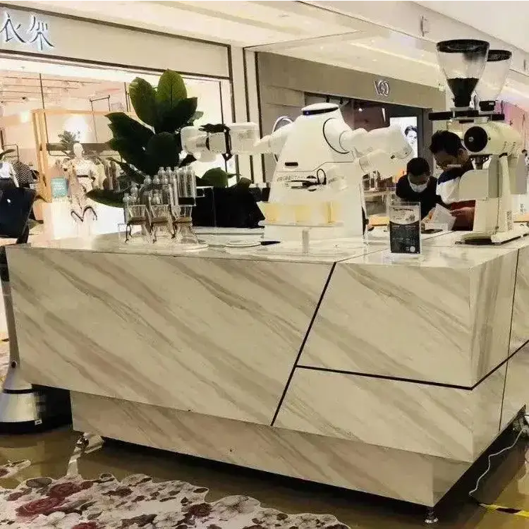 Marble-patterned coffee bar with Orionstar robot serving coffee using dual arms