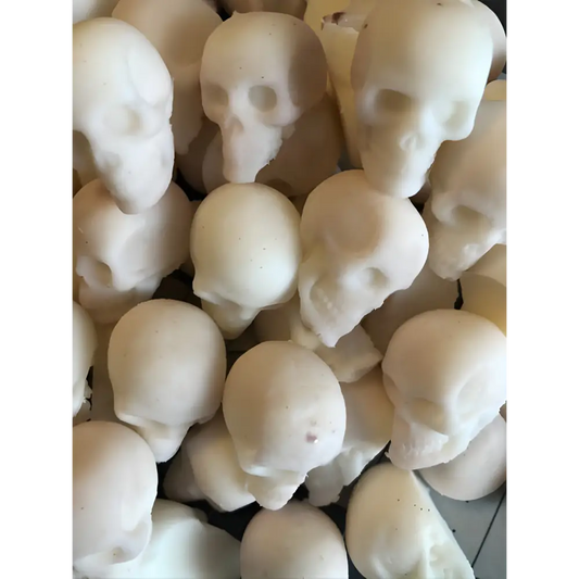 White chocolate skulls for Palo Santo Mini Skull Wax Melt Ritual on display