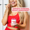Pink inositol multivitamin capsules.