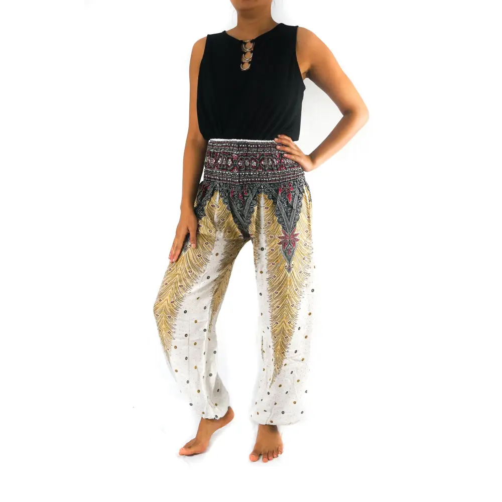 Woman in patterned Peacock Women Boho Harem Pants and a black top for a chic look