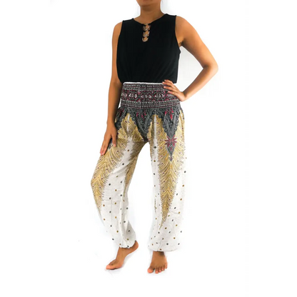 Woman in patterned Peacock Women Boho Harem Pants and a black top for a chic look