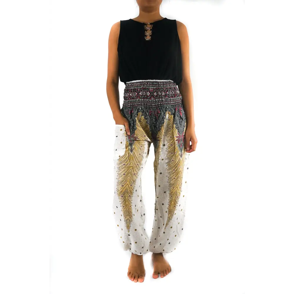 Woman in a black top and Peacock Women Boho Harem Pants with a fun pattern