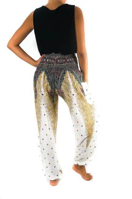 Slay the Boho Scene: Bold Black Top and Patterned Harem Pants - Estalios