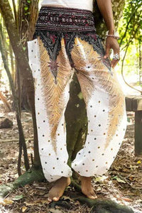 Slay the Boho Scene: Bold Black Top and Patterned Harem Pants - Estalios