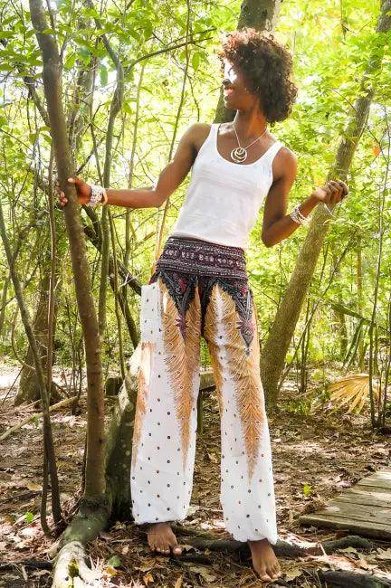 Slay the Boho Scene: Bold Black Top and Patterned Harem Pants - Estalios