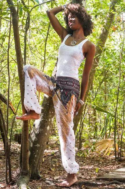 Slay the Boho Scene: Bold Black Top and Patterned Harem Pants - Estalios