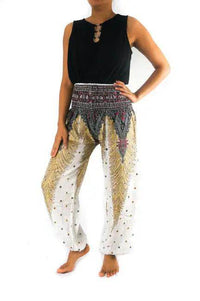 Slay the Boho Scene: Bold Black Top and Patterned Harem Pants - Estalios