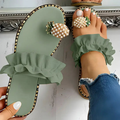 Green ruffled slides with pineapple details perfect for your Pineapple Pearl Beach vibe