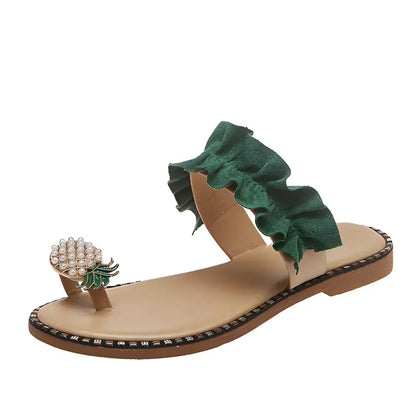 Beige sandal with green ruffle and pineapple toe ring for Pineapple Pearl Beach style