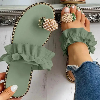 Army Green ruffled slides with pineapple embellishments perfect for the Pineapple Pearl Beach