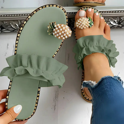 Green ruffled Pineapple Pearl Beach Slides with pineapple embellishments for fun summer vibes