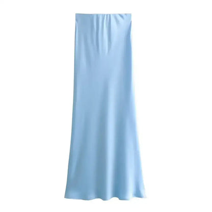 Light blue satin skirt paired with a Pink & White Mesh Navy Blue Midi Skirt