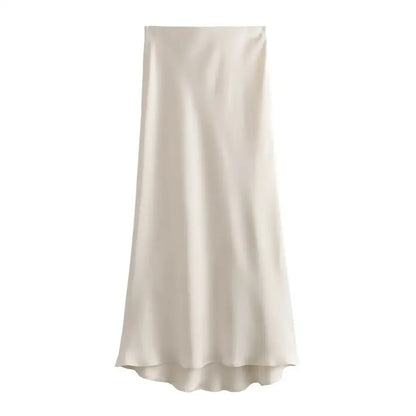 Cream-colored satin midi skirt perfect for pairing with deep purple or navy blue tops