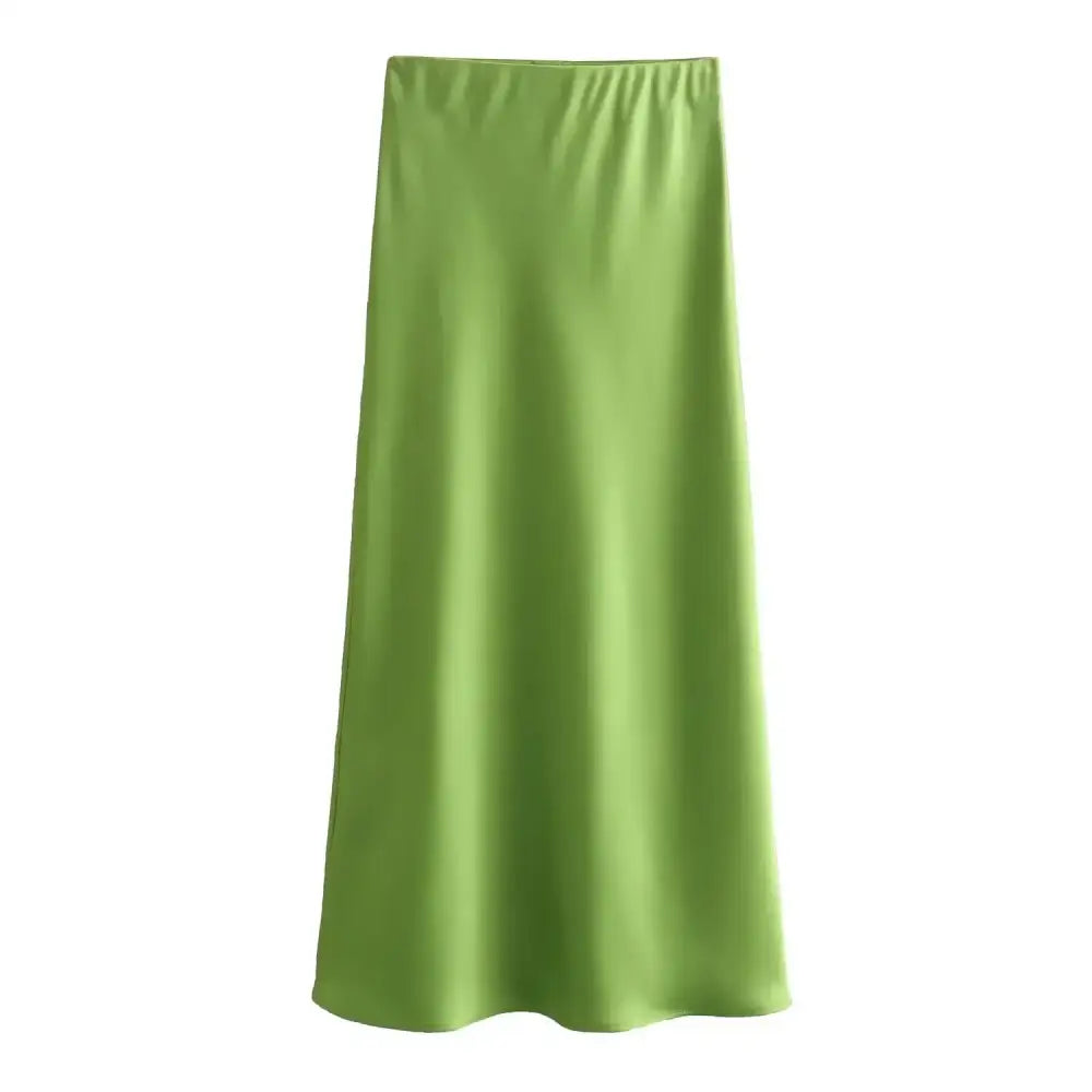 Green satin midi skirt paired with a Pink & White Mesh Navy Blue Midi Skirt for style