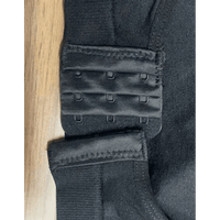 Unleash Invisible Support: The Seamless Black Bra! Experience unparalleled comfort and a smooth silhouette with our Black Seamless Bra. This bra is designed to disappear under - Estalios