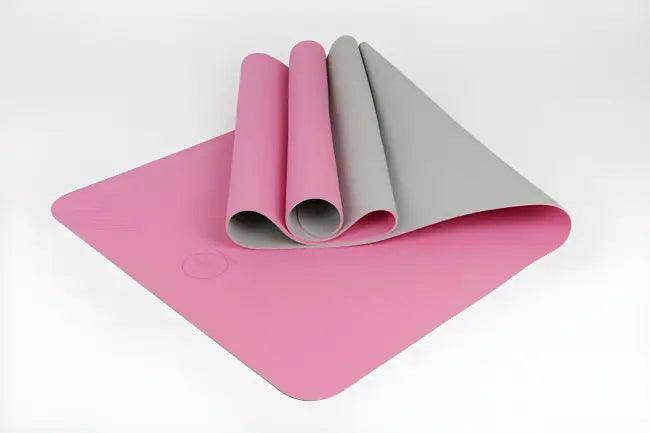 Amp Up Your Practice with the Bold Orange Gray Yoga Mat - Estalios