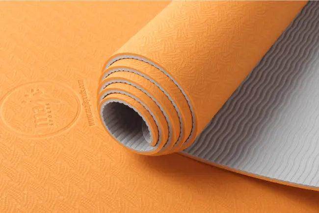 Amp Up Your Practice with the Bold Orange Gray Yoga Mat - Estalios