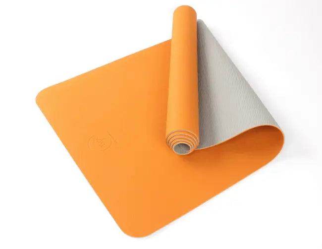 Amp Up Your Practice with the Bold Orange Gray Yoga Mat - Estalios
